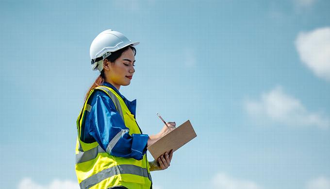 lady completing audit list