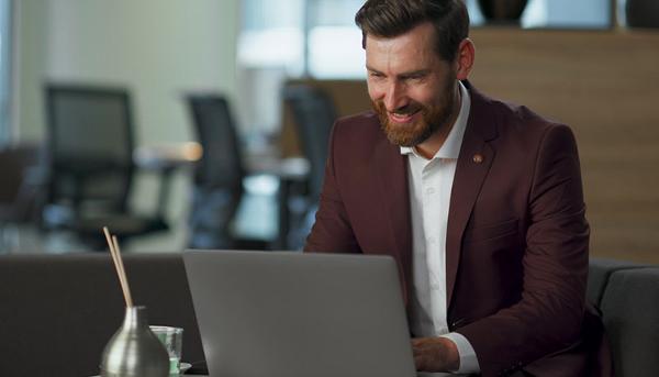 man looking at laptop screen